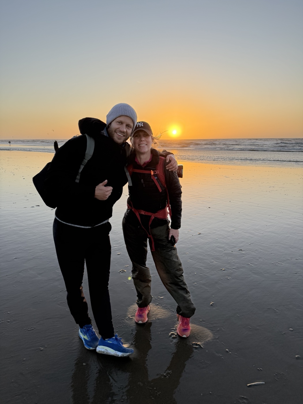 Floris and a friend at the coast at sunset